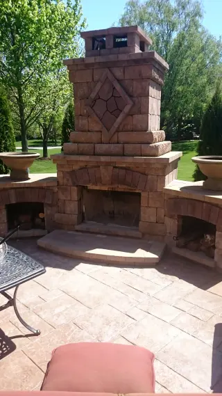 Outdoor fireplace with comfortable seating area